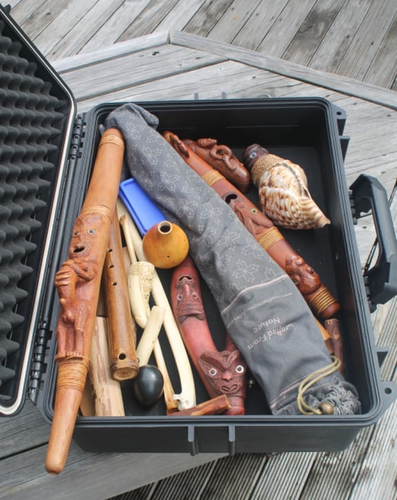 An image of an open case displaying Riki's collection of Taonga pūoro.