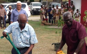Pacific Games Council President Vidhya Lakhan and Solomon Islands PM,the Hon. Manasseh Sogavare, take a spade.