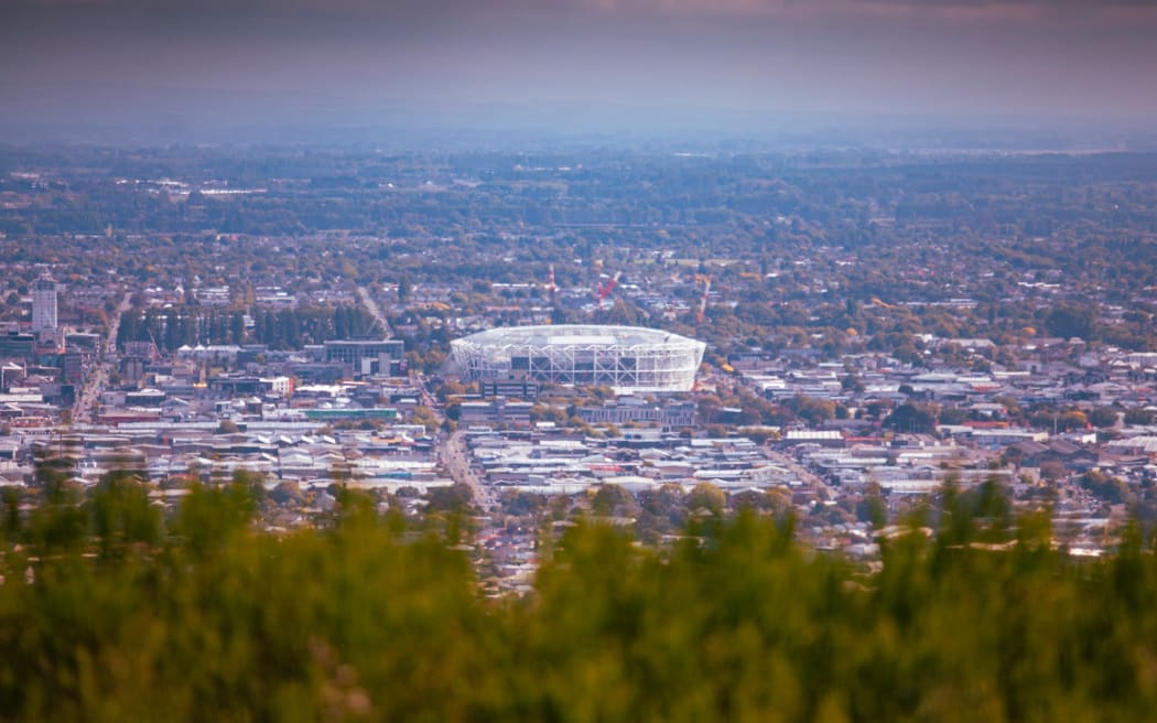 Christchurch Central City from the Port Hills Summit Road. Te Kaha Stadium