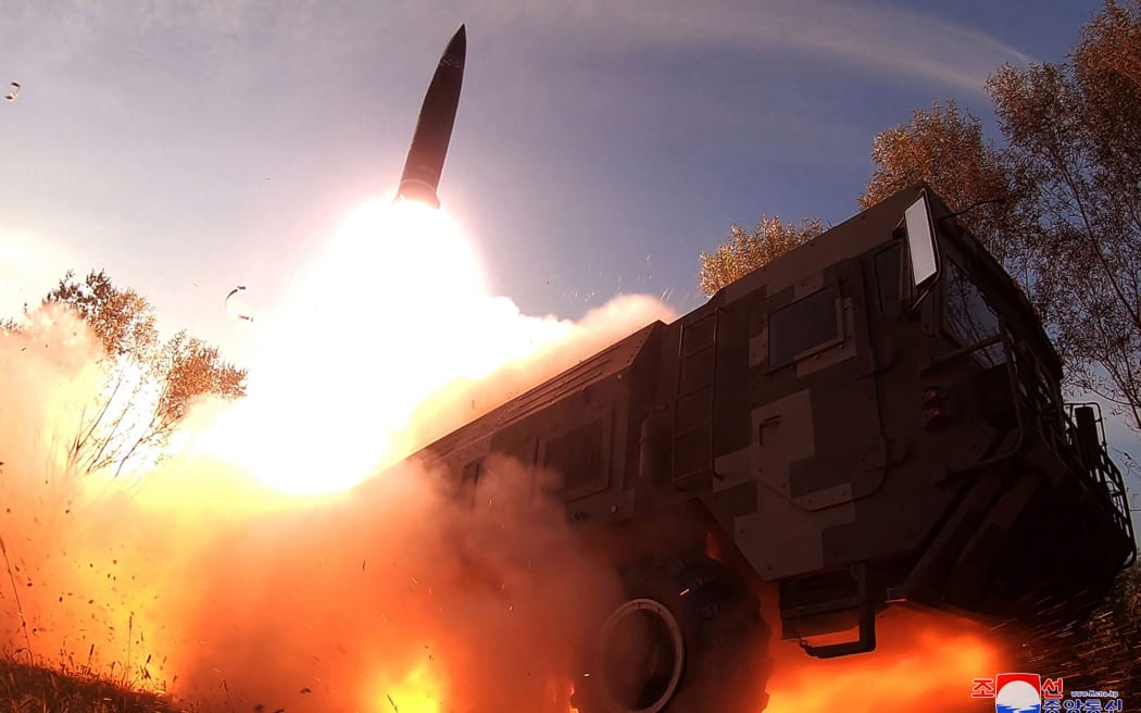 This undated picture released from North Korea's official Korean Central News Agency (KCNA) on 10 October, 2022 shows a Hokkaido missile launch training test by the Korean People's Army Tactical Nuclear Operation Unit at an undisclosed location.