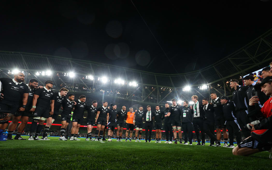 All Blacks huddle after the test win against Ireland in Dublin.