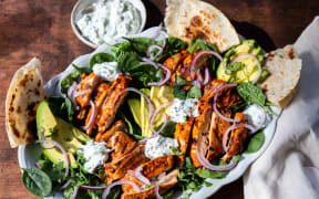 Tandoori chicken salad with garlic cucumber yoghurt,
