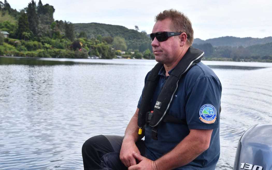 Bay of Plenty Regional Council lakes senior maritime officer Roly Bagshaw on Lake Ōkāreka.