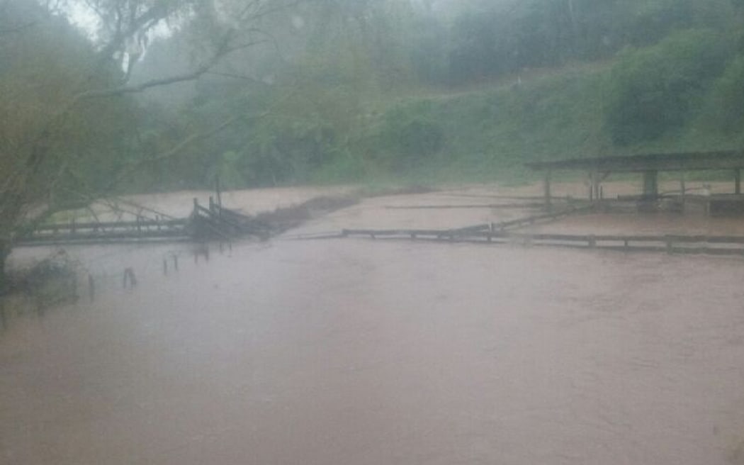Fences on Neil Heather's farm were broken and flooded after the Ngongotaha Stream breached its banks.