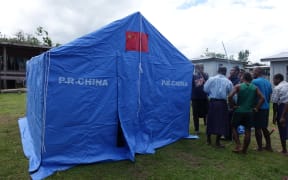 Tents donated by China were flown into villages in Fiji by the NZ Defence Force after Cyclone Winston. This one is in Nawaisomo village, Fiji.