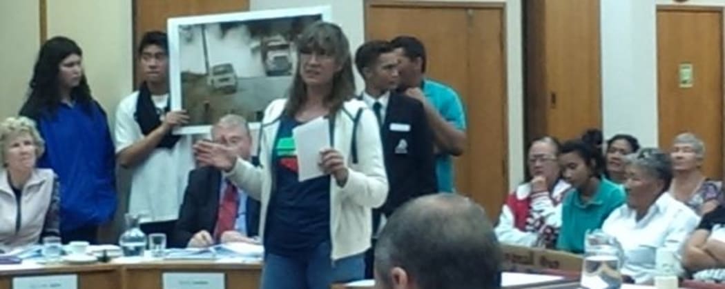 Protesters pack the Whangarei District Council chambers to demand gravel roads - including those being pounded by logging trucks - are sealed.