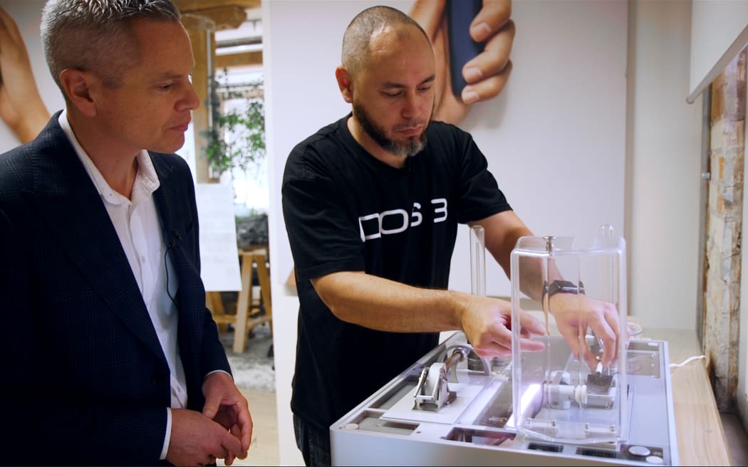 Gordon Otukolo demonstrates the IQOS for Guyon Espiner. For Guyon's feature Smoke and Mirrors: Big Tobacco targeting Māori with e-cigarettes