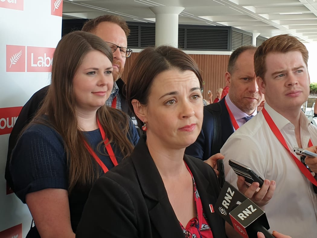 Claire Szabo (centre) talks to the media after her election as Labour president at the party's annual conference in Whanganui.