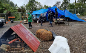 About 20 protesters who believe Mt Messenger is being desecrated have set up camp at its summit.