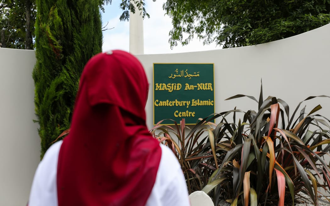 People gather outside Al Noor Mosque