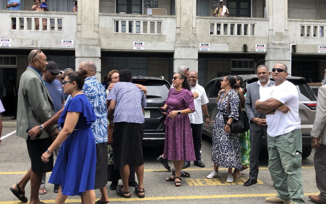 Bainimarama's family members and FijiFirst MPs and supporters outside the court house after he was granted an absolute discharge - meaning his conviction was not registered.