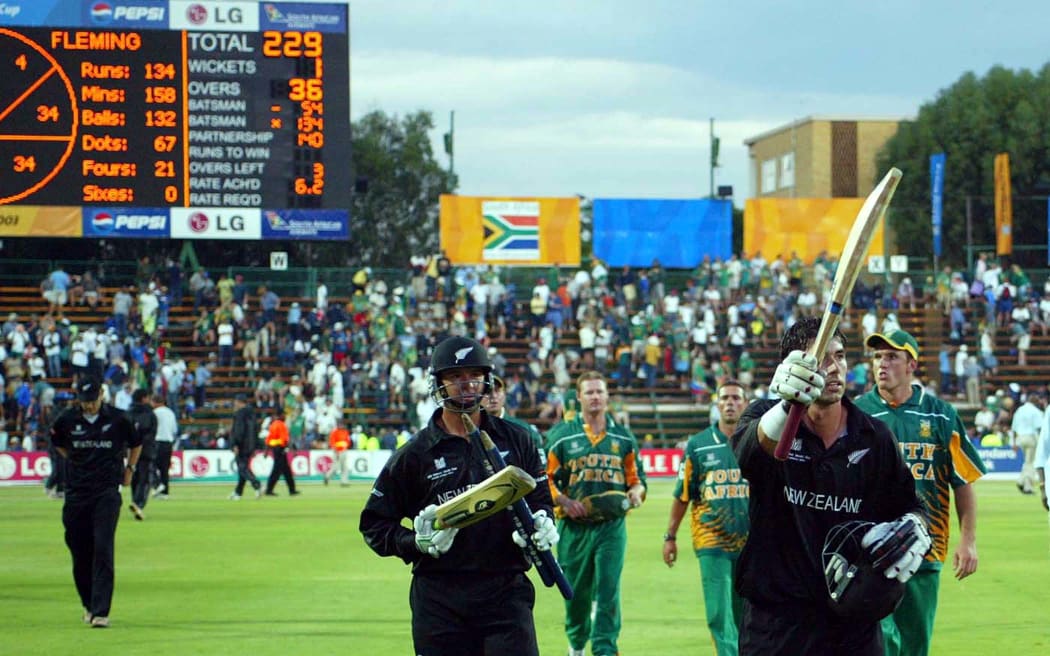 Stephen Fleming walks off the pitch with his score at 134 after winning against South Africa.