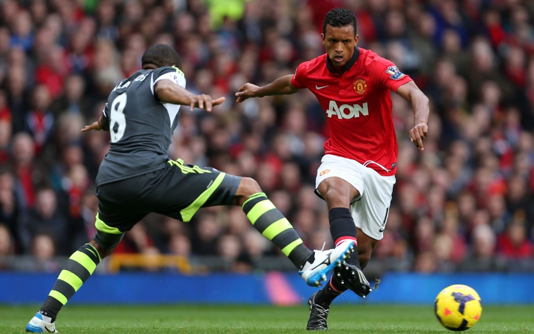 The Portugese footballer Nani playing for Manchester United.