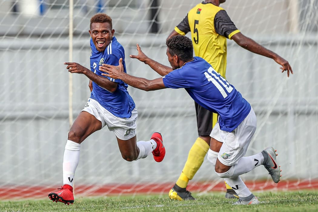 Solomon Islands Augustine Waita celebrates scoring a goal.