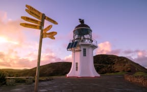 Cape Reinga, north edge of New Zealand, Tasman sea and Pacific oceans meet here. Beautiful seascape with lighthouse.