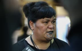 Labour MP Nanaia Mahuta answering media questions on her way to the House