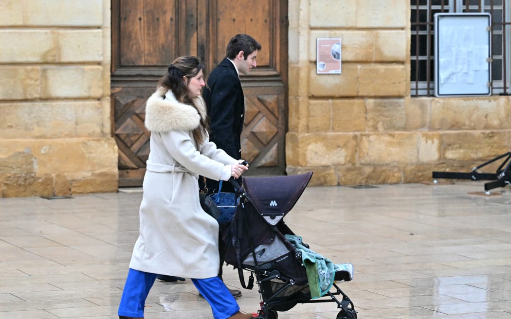 Marie (L) et Colomban (4th L) Soleil, parents of Emile, who went missing in 2023 and whose remains were found in March 2024, arrive at the funeral ceremony in Saint-Maximin-la-Sainte-Baume, southern France, on February 8, 2025. Four people, including Emile's grandfather Philippe Vedovini and grandmother, have been held for questionning by police on grounds of "homicide" and "concealment of a corpse" early on March 25, 2025, the prosecutor of Aix-en-Provence announced in a communique.Emile, a two-and-a-half year old boy went missing while at the summer home of his grandparents in the French Alpine tiny hamlet of Le Haut-Vernet on July 8, 2023. (Photo by Miguel MEDINA / AFP)