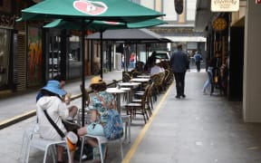 MELBOURNE, AUSTRALIA - OCTOBER 22: People are seen spending their time at a cafe after Covid-19 lockdown ended in Melbourne, Australia on October 22, 2021.