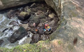 A rescue mission at the Whiritoa blowhole in Coromandel.