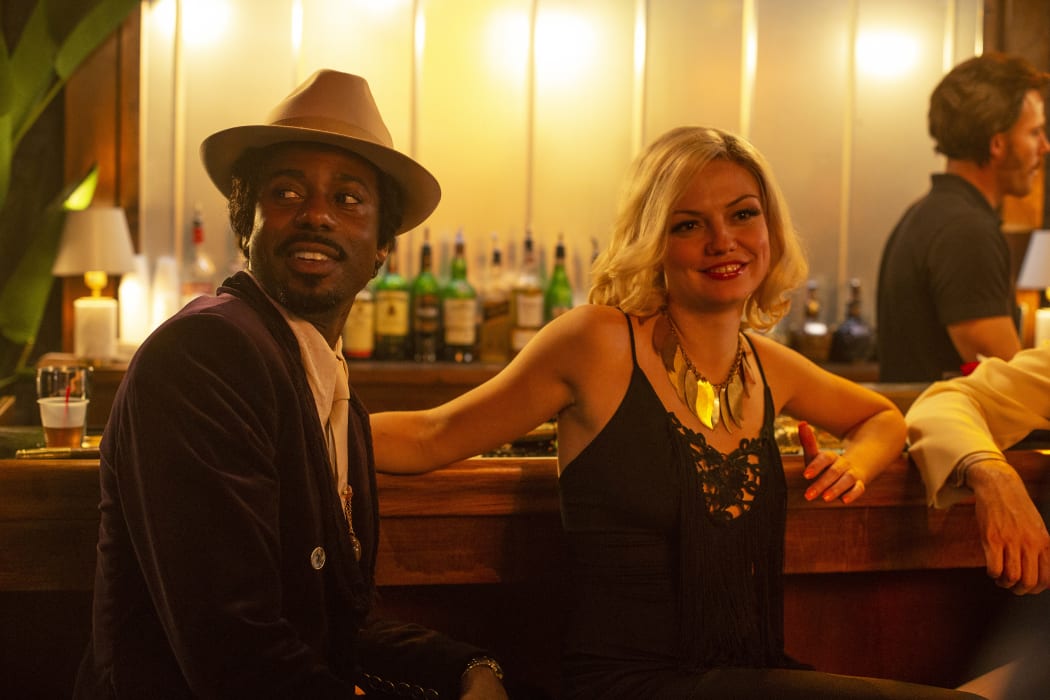 Gary Carr as CC and Emily Meade as Lori in happier times during The Deuce.