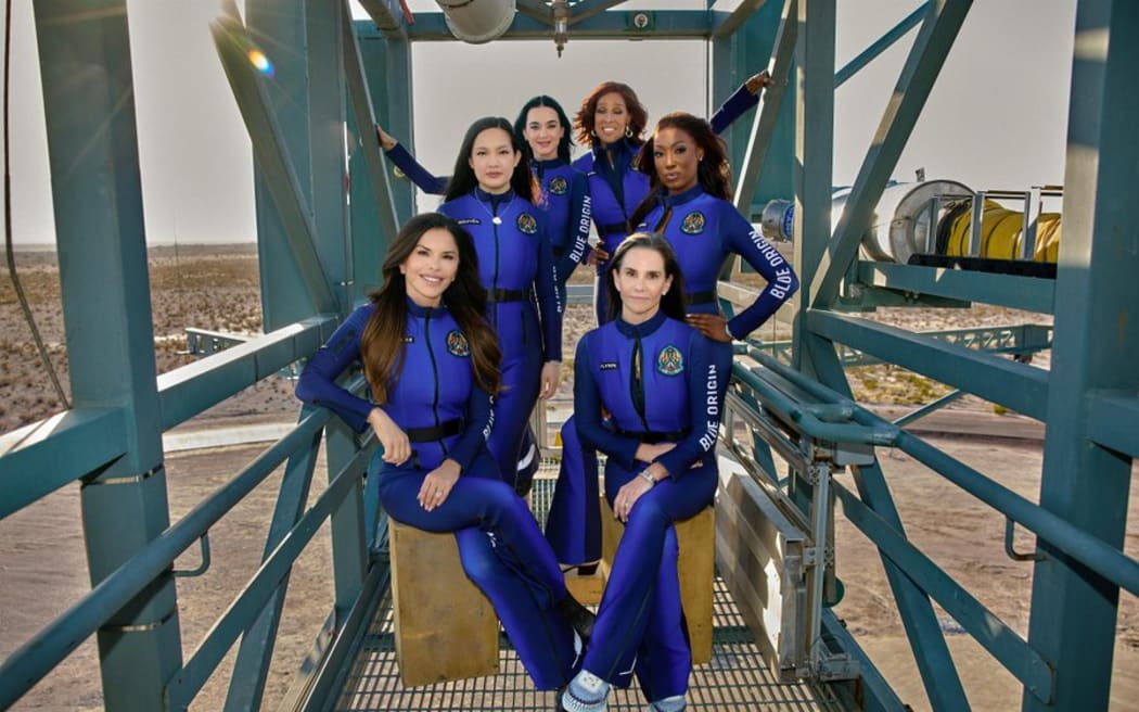 From left - entrepreneur Lauren Sanchez, former NASA scientist Amanda Nguyen, singer Katy Perry, TV presenter Gayle King, former NASA scientist Aisha Bowe and film producer Kerianne Flynn pose in their spacesuits ahead of an all-woman sub-orbital mission aboard the New Shepard rocket.