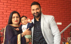 Niraj Thakur, his wife Anuradha and daughter Kiarra are stuck in India and worried about the future.