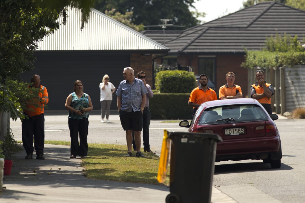 Residents watch the fires.