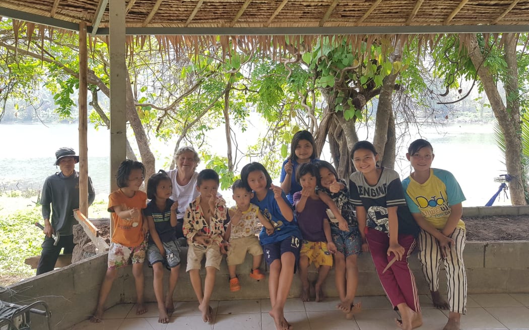 Catherine Riley-Bryan with some of the children at Bamboo School in Thailand.