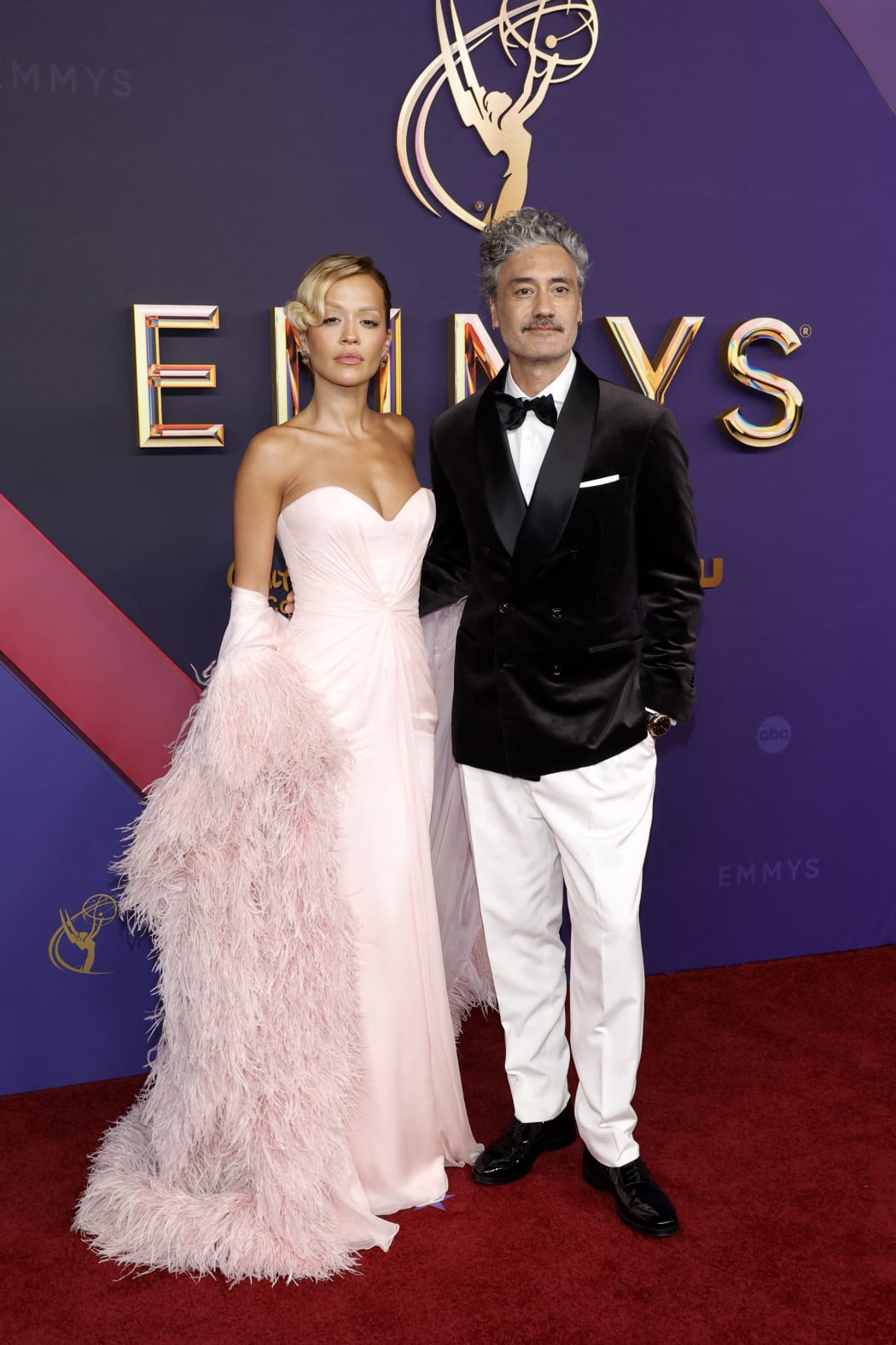 LOS ANGELES, CALIFORNIA - SEPTEMBER 15: (L-R) Rita Ora and Taika Waititi attend the 76th Primetime Emmy Awards at Peacock Theater on September 15, 2024 in Los Angeles, California.   Frazer Harrison/Getty Images/AFP (Photo by Frazer Harrison / GETTY IMAGES NORTH AMERICA / Getty Images via AFP)