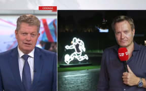 Danish television reporter Rasmus Tantholdt speaks during a live cross from Qatar