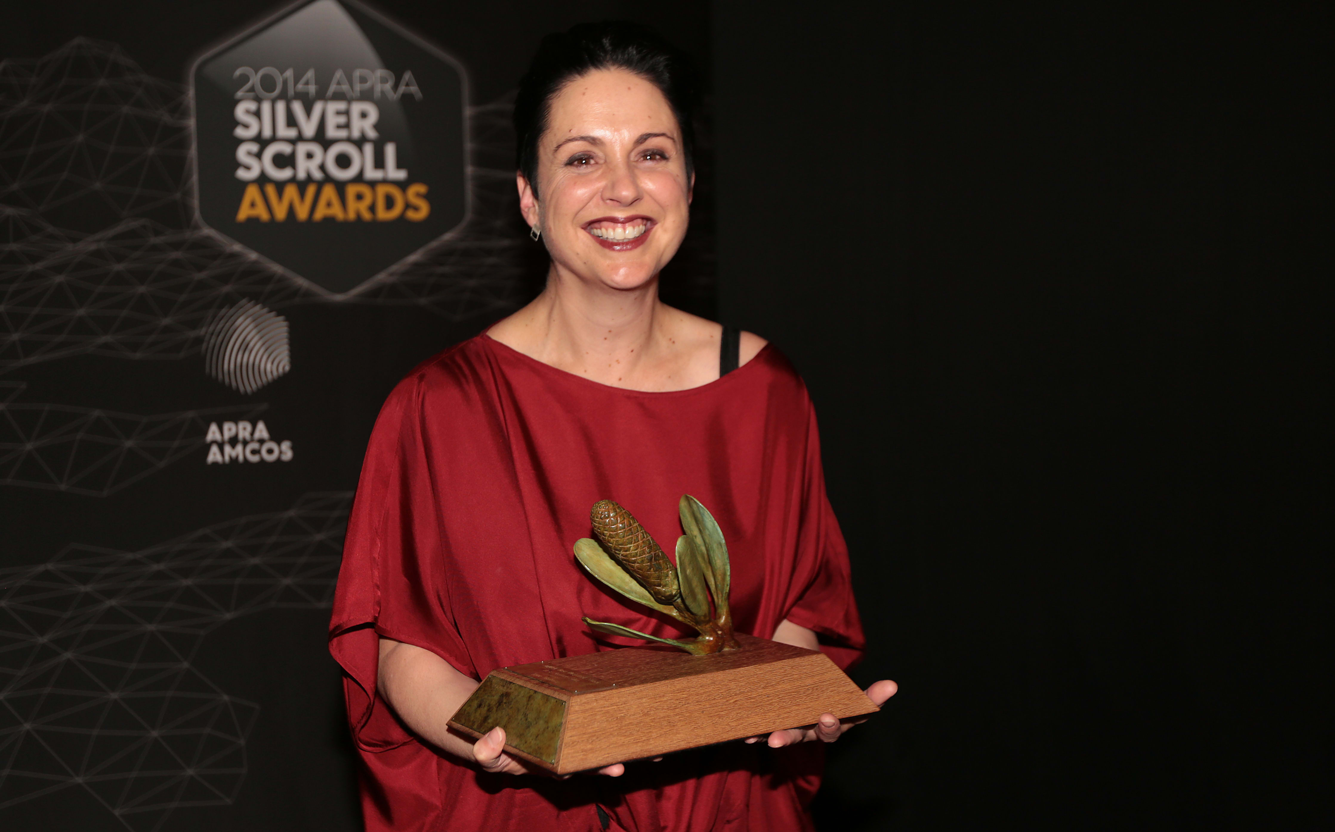 Victoria Kelly poses with her award at the Silver Scrolls Photo RNZ Diego Opatowski
