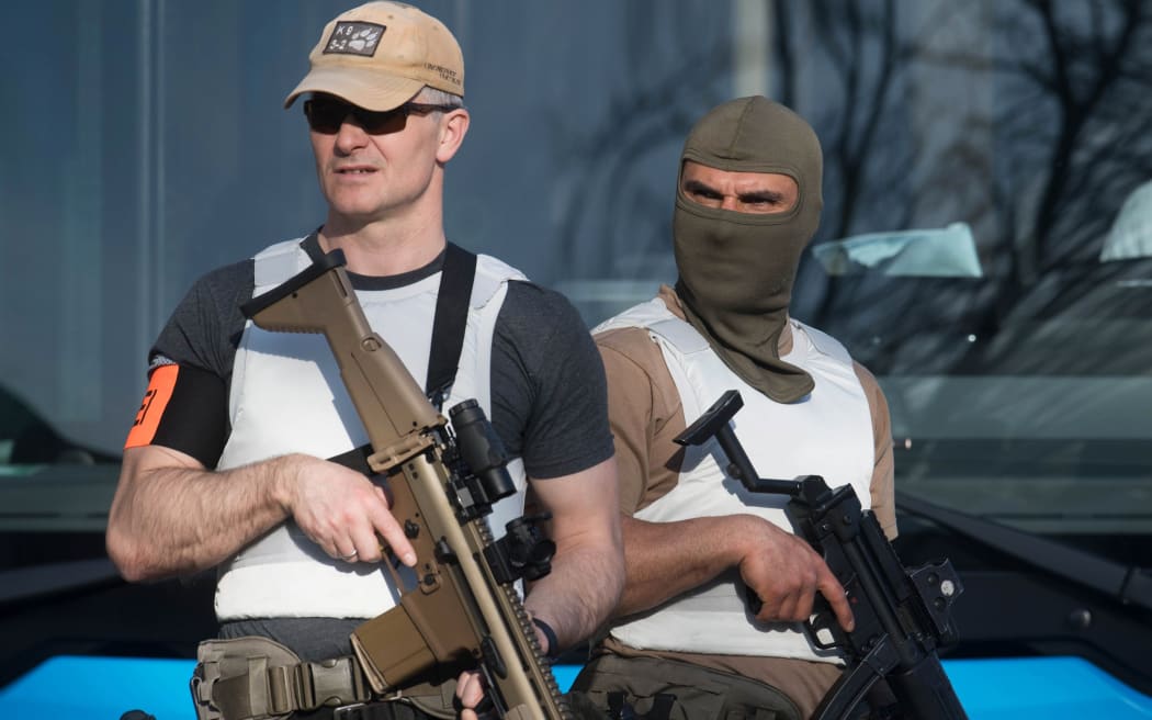 Special Police officers are seen at the scene when several people were killed and injured when a car ploughed into pedestrians in Muenster, western Germany