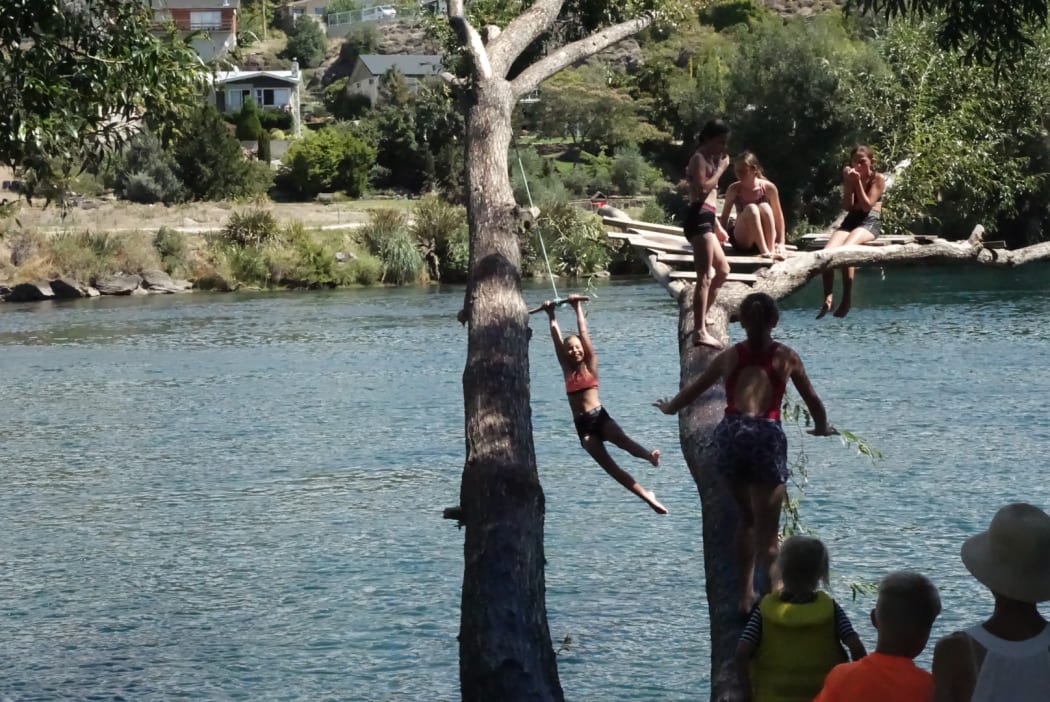 Young people keeping cool in the heat at Alexandra.