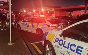 Police and ambulance outside the Pooja Jewellers in Papatoetoe after reports of an armed robbery.