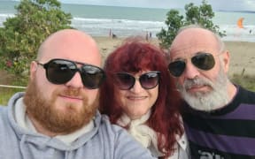 Dr Ana Popovska Stojanovska with her son Ivan Kostovski and her husband Toshe Stojanovski.