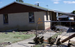 The flood damage in Edgecumbe looked more like the aftermath of an earthquake, said the local mayor.