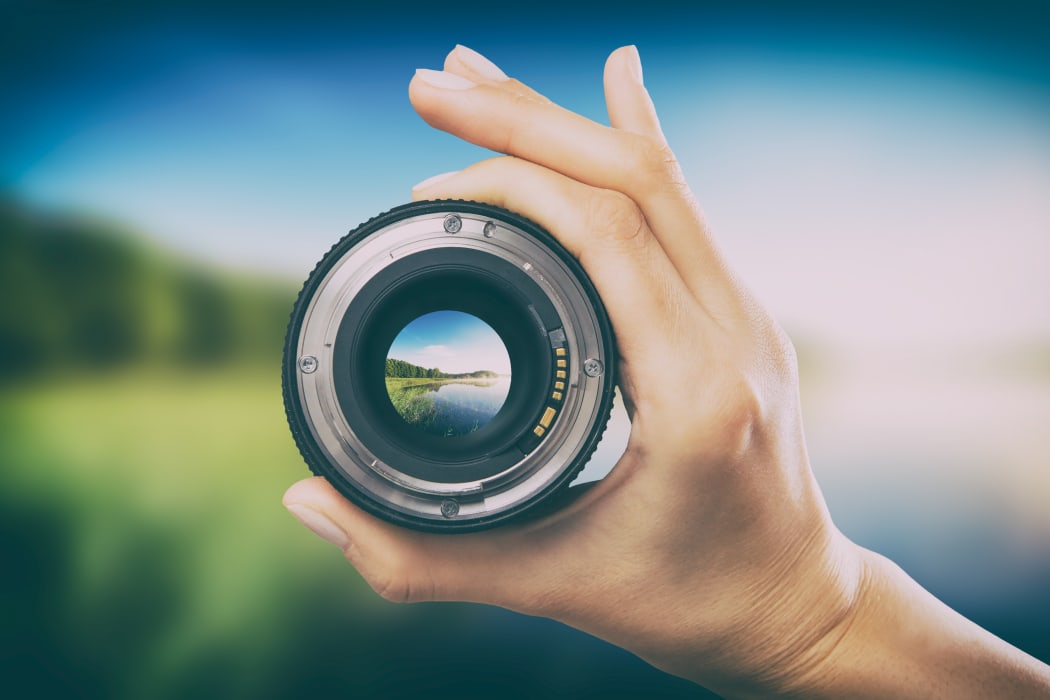photography view camera photographer lens lense through video photo digital glass hand blurred focus people concept - stock image