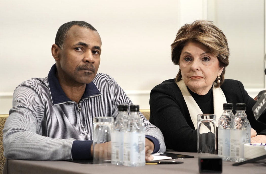 Gary Dennis represented by attorney (C) Glorida Allred hold a press conference to discuss alleged new R Kelly tape in New York City.