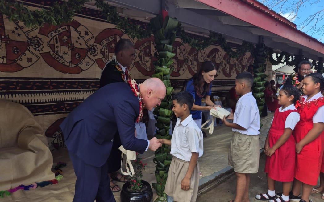 Prime Minister Christopher Luxon at G.M.S. Tokomololo school in Tonga after the Pacific Islands Forum. The New Zealand government has paid for dual language books to be printed.