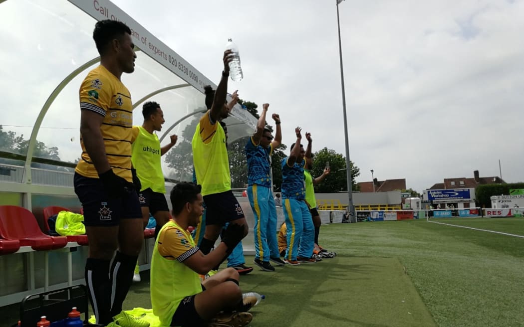 Tuvalu celebrate their second goal.