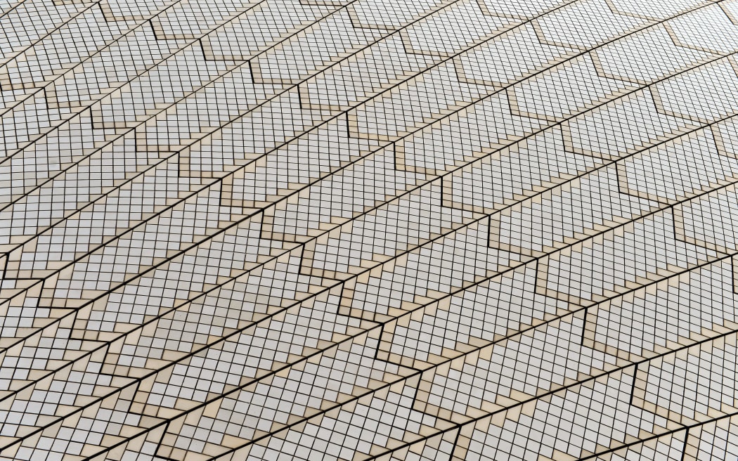 Tiles are shown on Sydney's iconic Opera House building's tallest sail, known as A2, which covers the Concert Hall.
