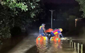Surf Life Saving Northern Region volunteers used IRBs to rescue people from the Auckland floods