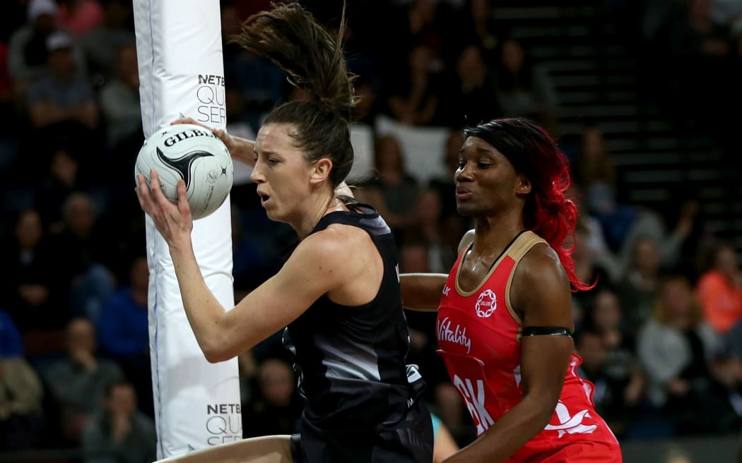 Bailey Mes is challenged by England`s Captain Ama Agbeze.