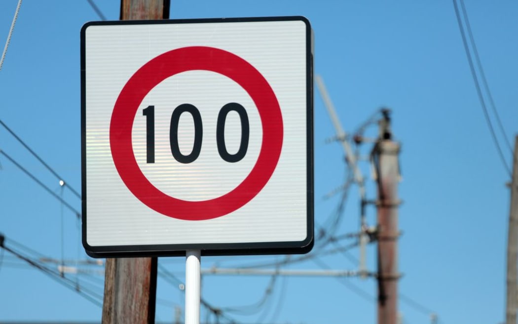 100 km speed limit sign.