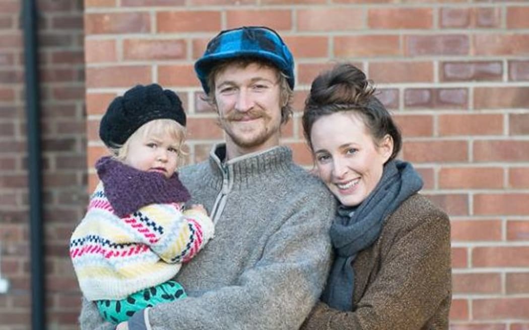Luke Concannon with his partner Milo Haigh and their daughter Rātā.