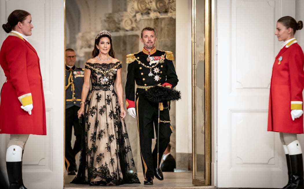 This photo taken on September 11, 2022 shows Crown Prince Frederik of Denmark and Crown Princess Mary of Denmark arriving for a gala dinner at Christiansborg Castle during the celebration of the Queen's 50th anniversary in Copenhagen, Denmark. Denmarks' Queen Margrethe announced in her New Years speech that she is abdicating on February 14, 2024. Crown Prince Frederik will take her place and become King Frederik the 10th of Denmark, while Australian born Crown Princess Mary will be Queen of Denmark. (Photo by Mads Claus Rasmussen / Ritzau Scanpix / AFP) / Denmark OUT