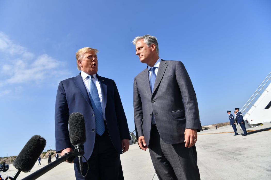 US President Donald Trump speaks next to new national security adviser Robert O'Brien.