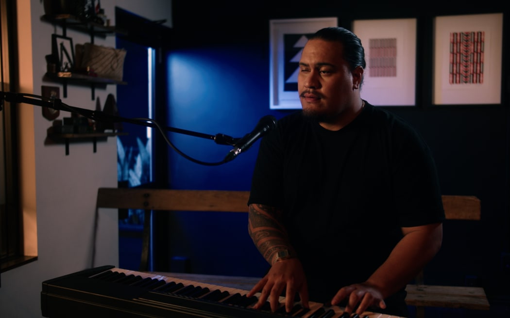 John on piano
