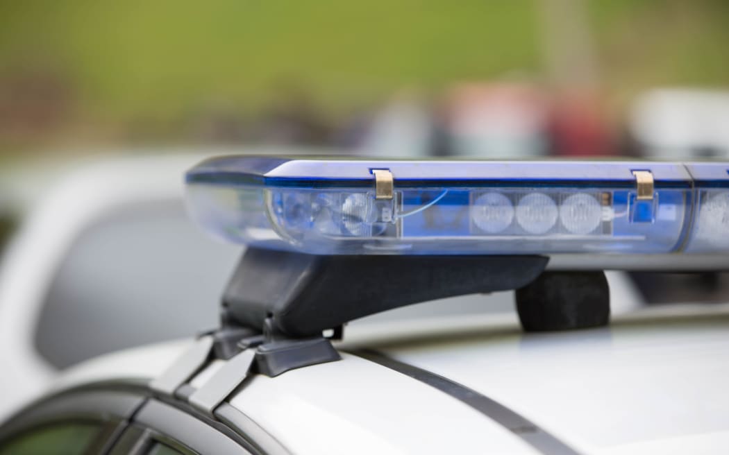 Police outside a property in Taharoa