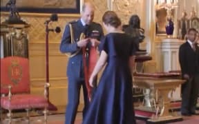 Screengrab: Jacinda Ardern receives a damehood from Price William in October 2024.